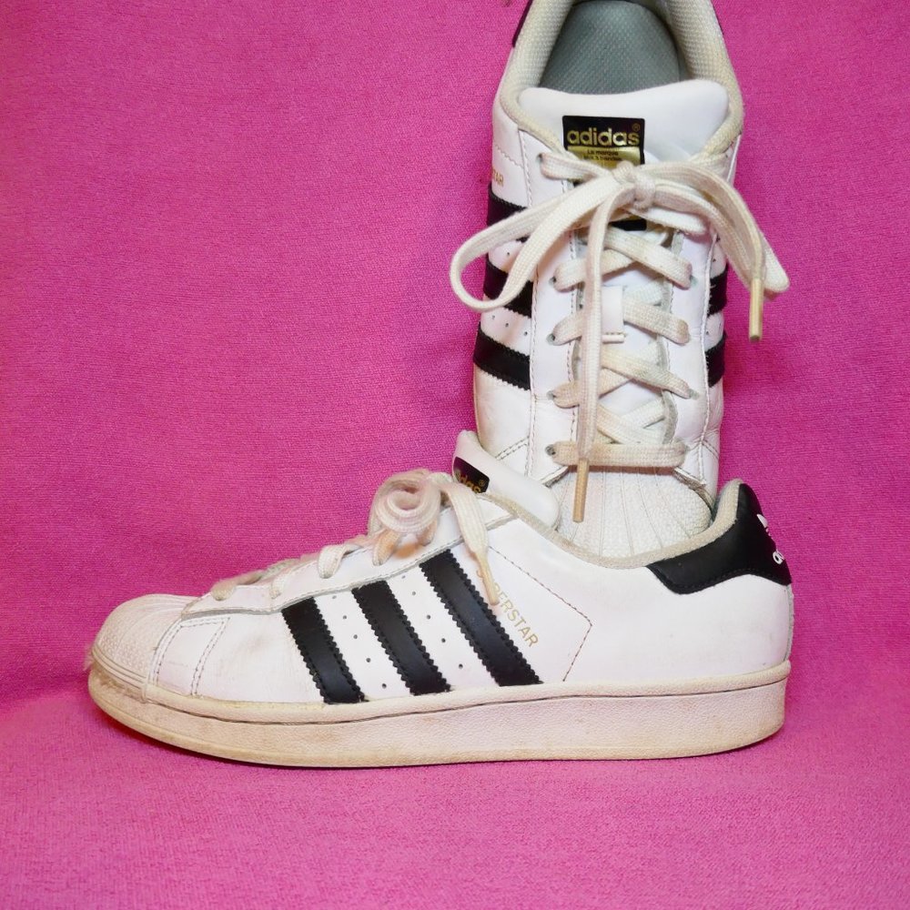 Adidas Superstar.  White with black stripes. Men's 7.  Womens 8.5.  Sz 39